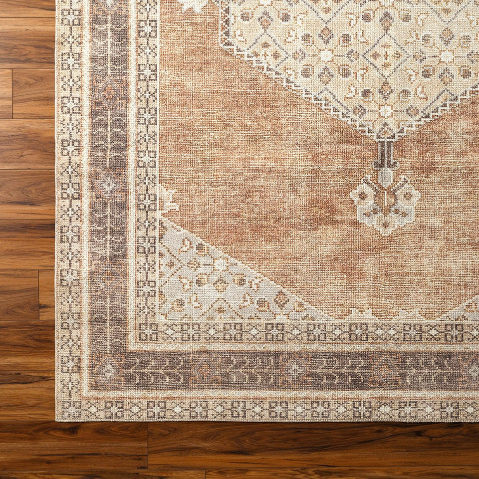 cinnamon traditional rug closeup corner on wood floor