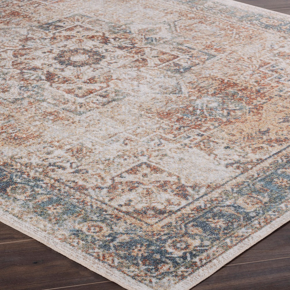 cinnamon traditional rug closeup corner on wood floor