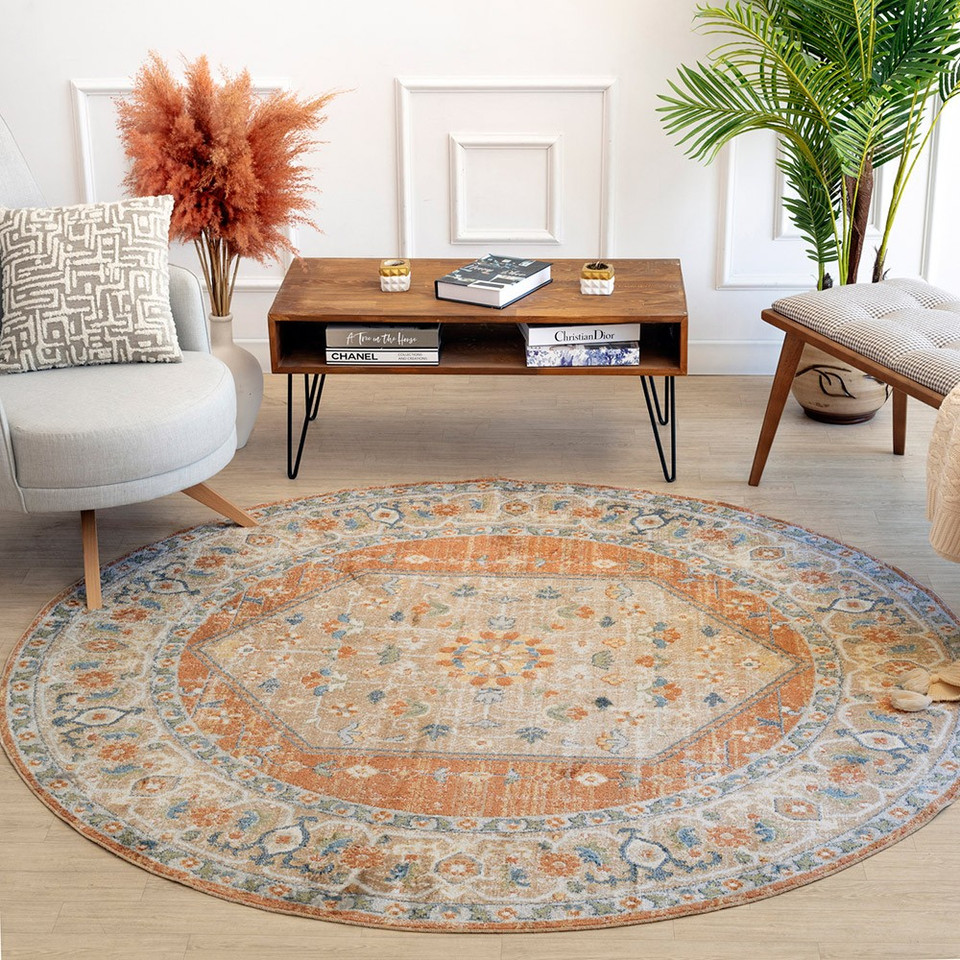 orange traditional rug in a room with matching decor