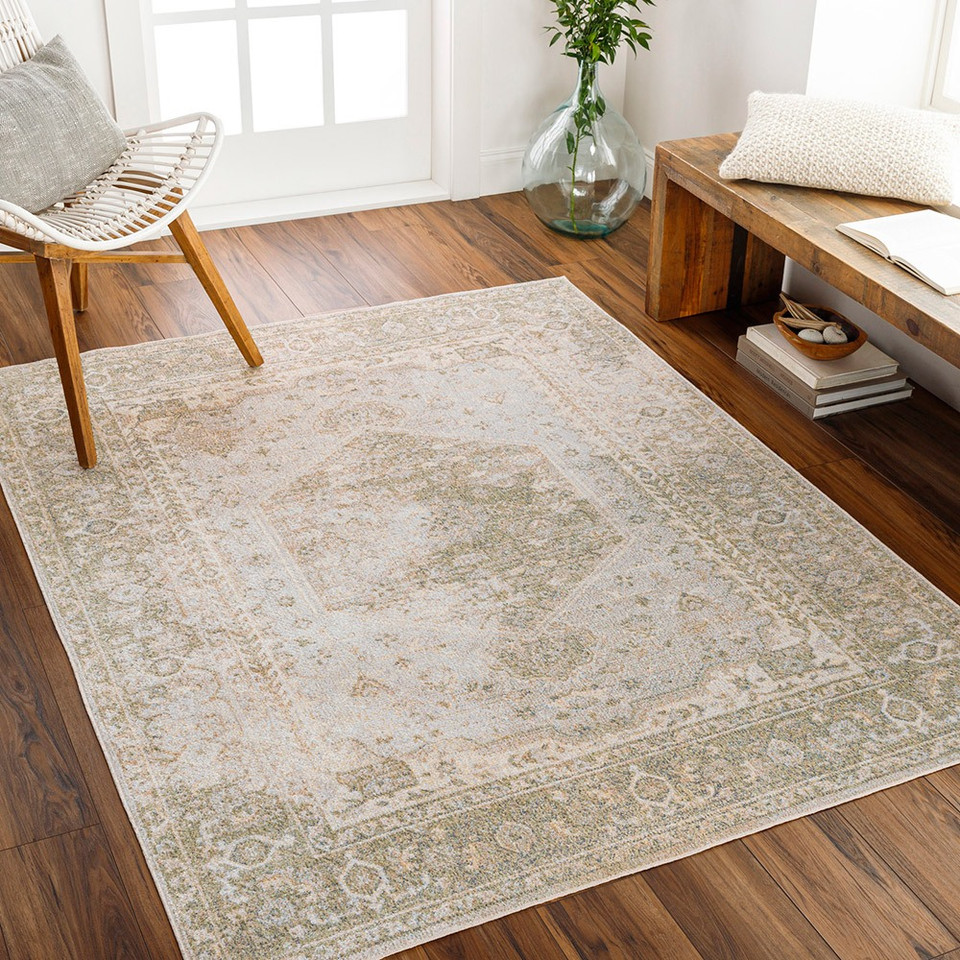 camel traditional rug in a room with matching decor