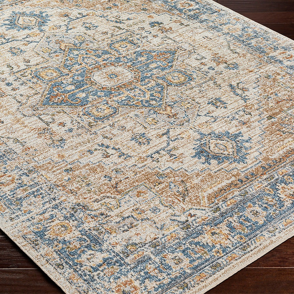 beige traditional rug closeup corner on wood floor