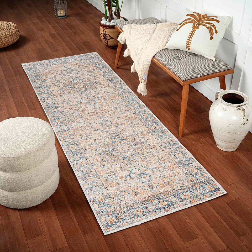 beige traditional rug in a room with matching decor