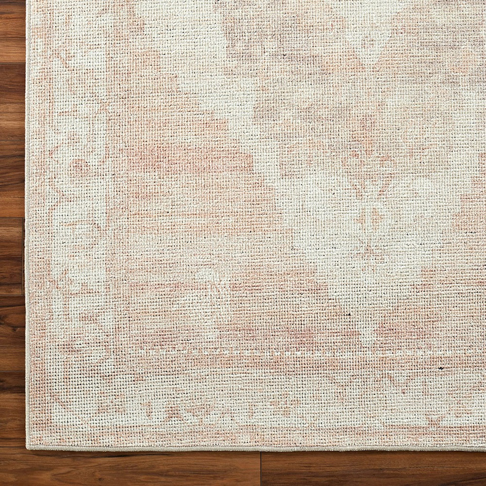 blush traditional rug closeup corner on wood floor