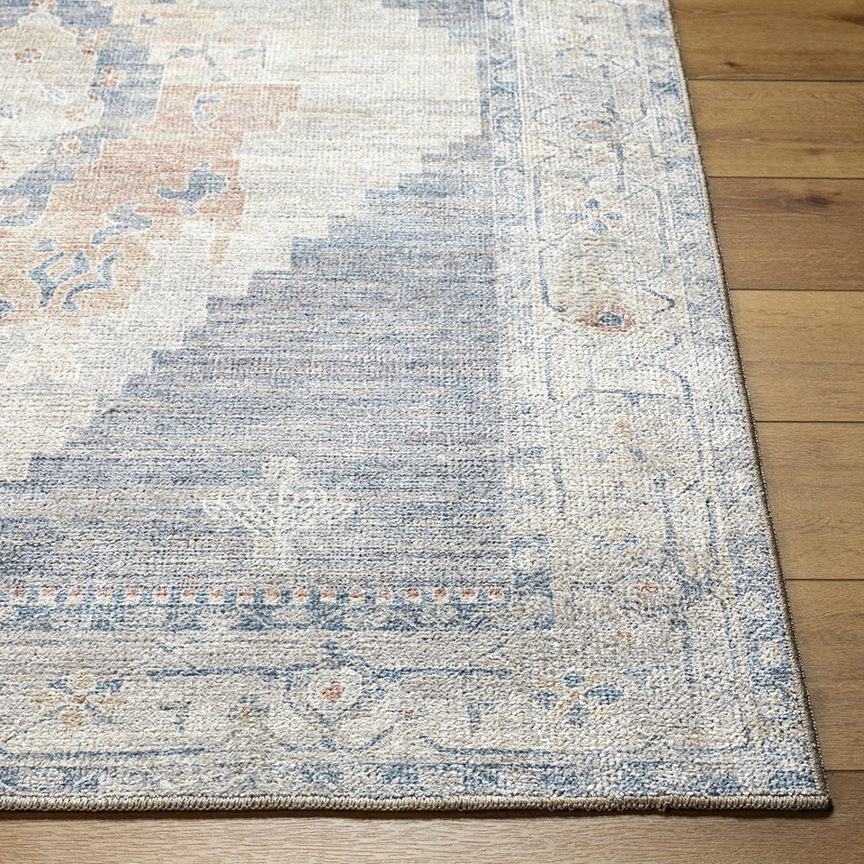 navy traditional rug closeup corner on wood floor