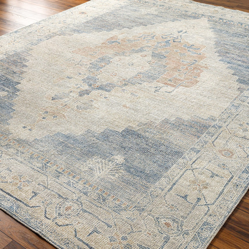 navy traditional rug closeup corner on wood floor