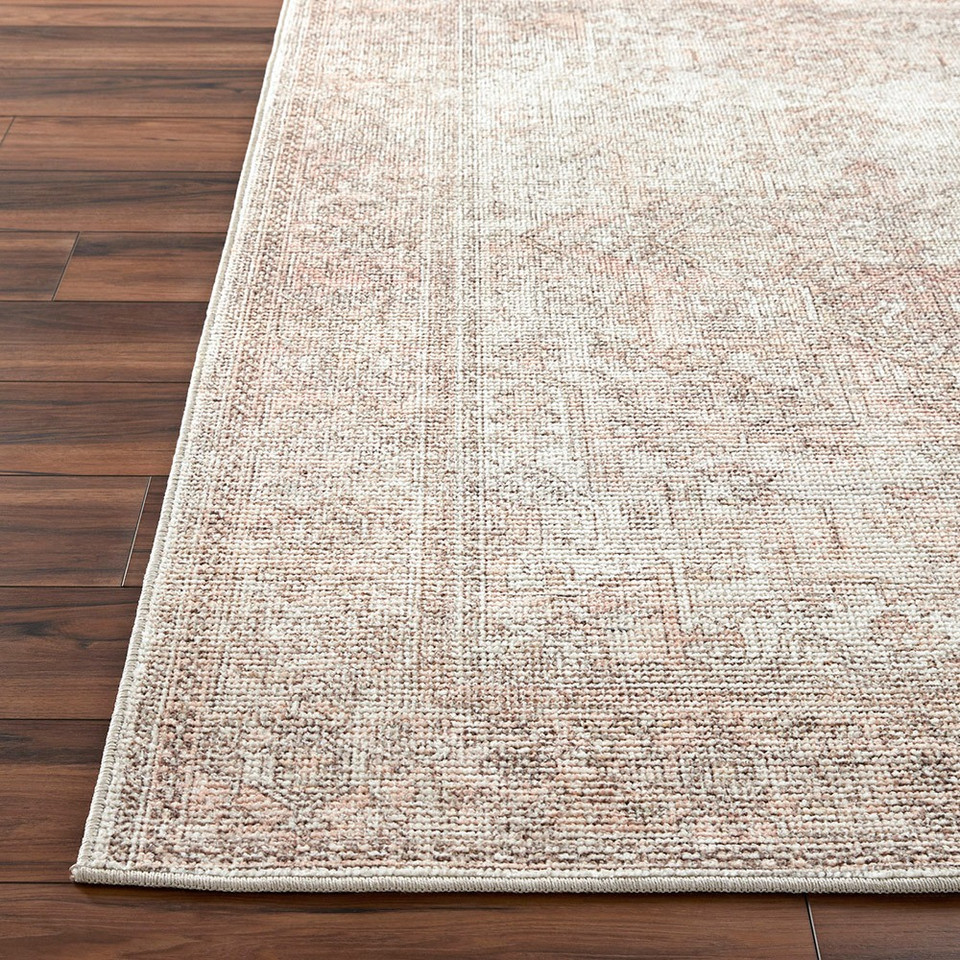 blush traditional rug closeup corner on wood floor