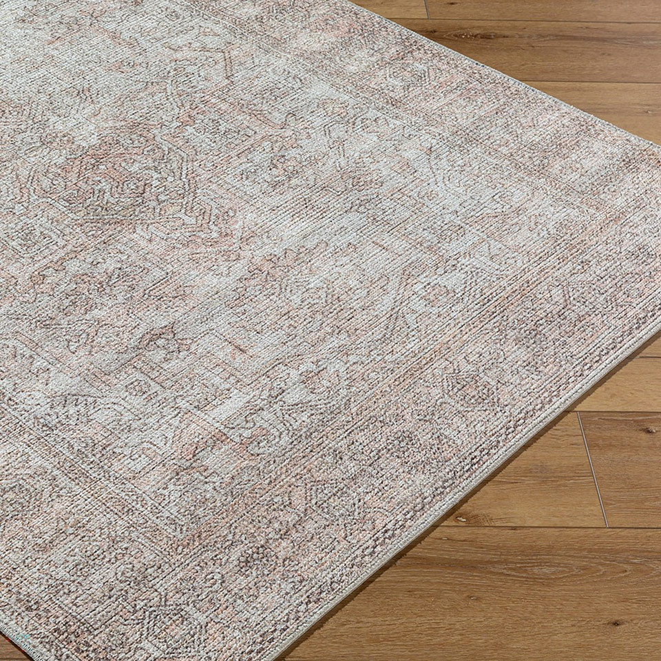 blush traditional rug closeup corner on wood floor