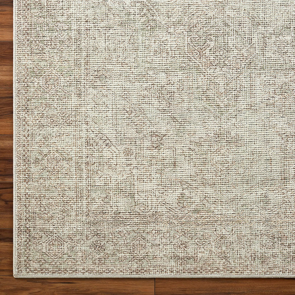 sage traditional rug closeup corner on wood floor