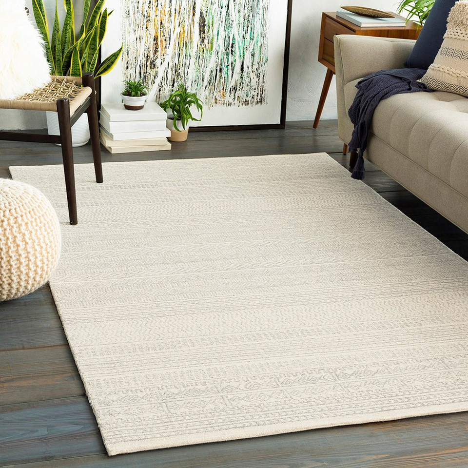 grey tribal wool rug in a room with matching decor