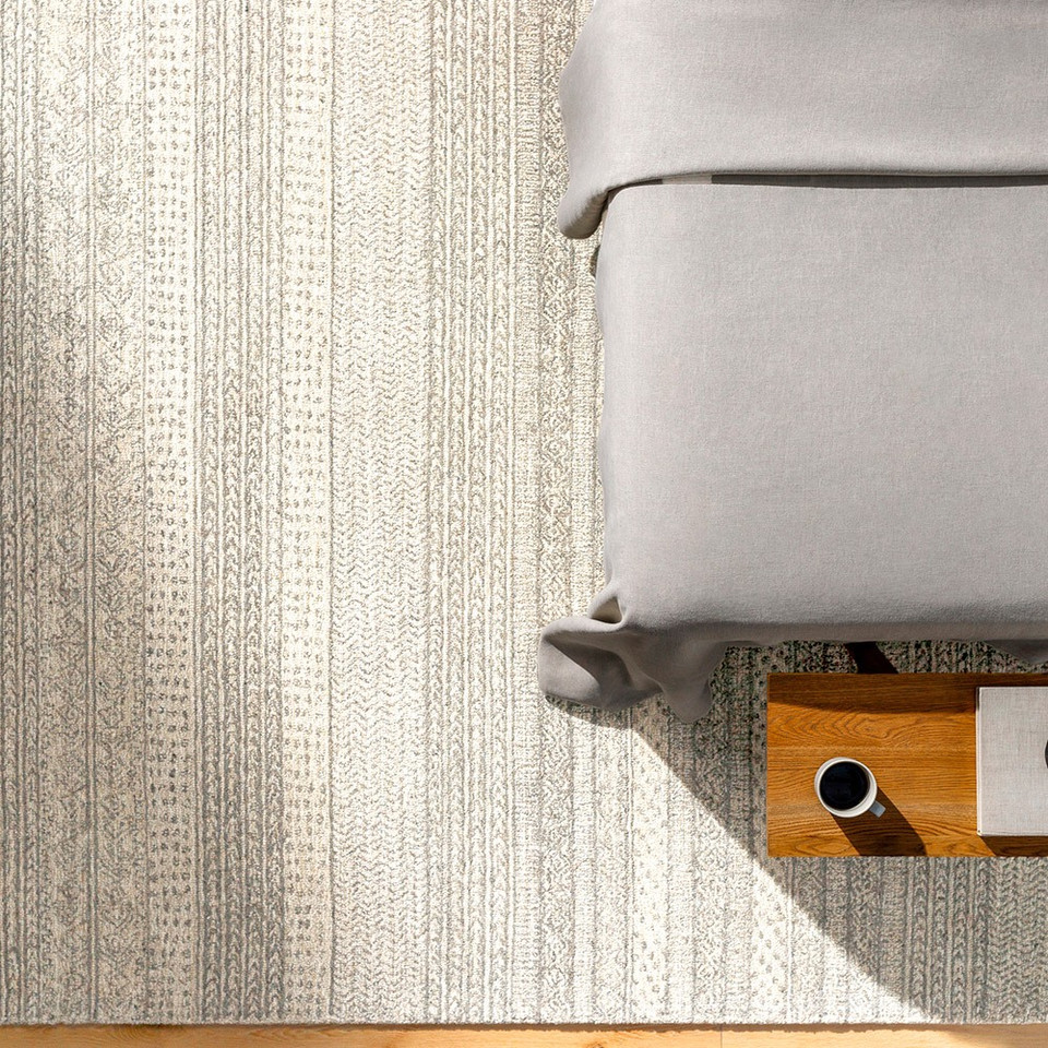 grey tribal wool rug in a room with matching decor