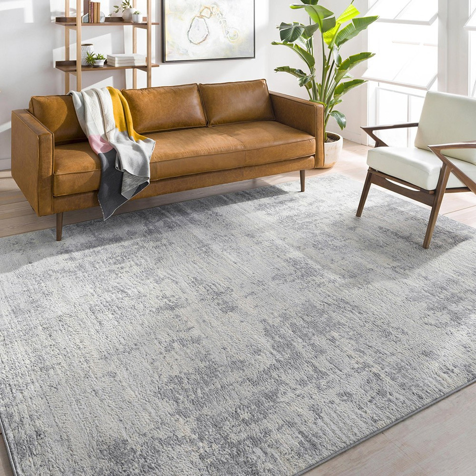 grey abstract rug in a room with matching decor