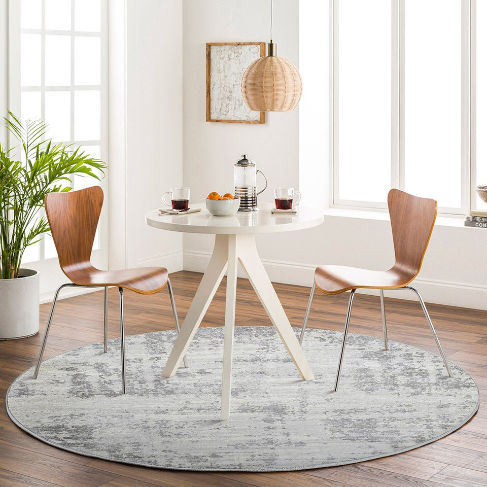 grey abstract rug in a room with matching decor