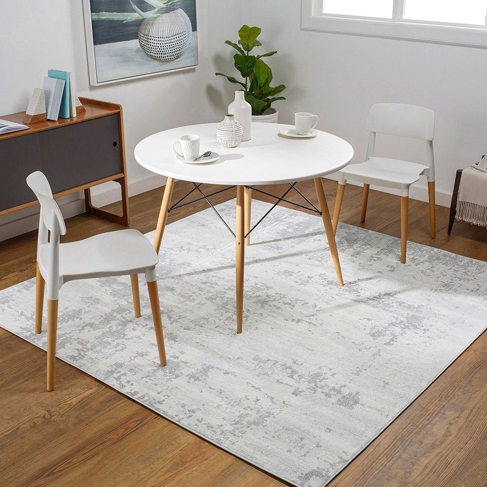 grey abstract rug in a room with matching decor