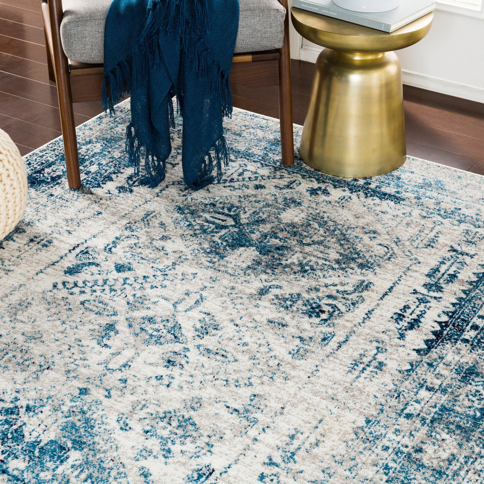 grey abstract rug in a room with matching decor