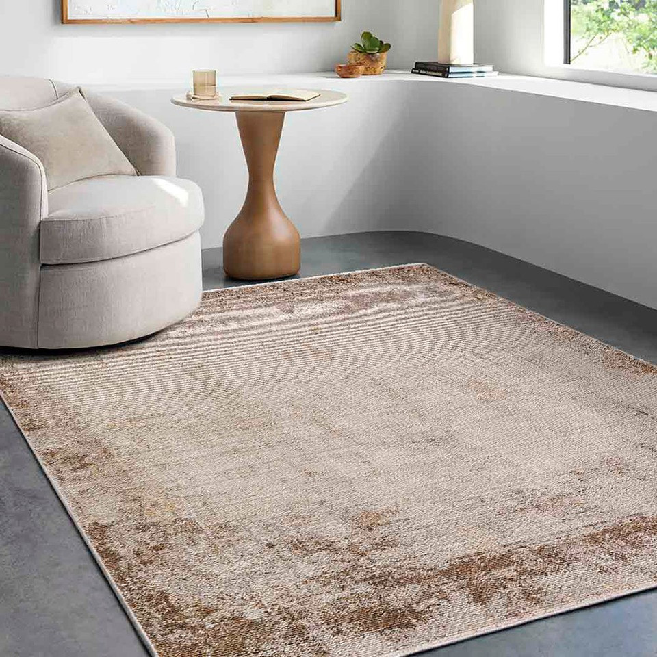cream abstract rug in a room with matching decor
