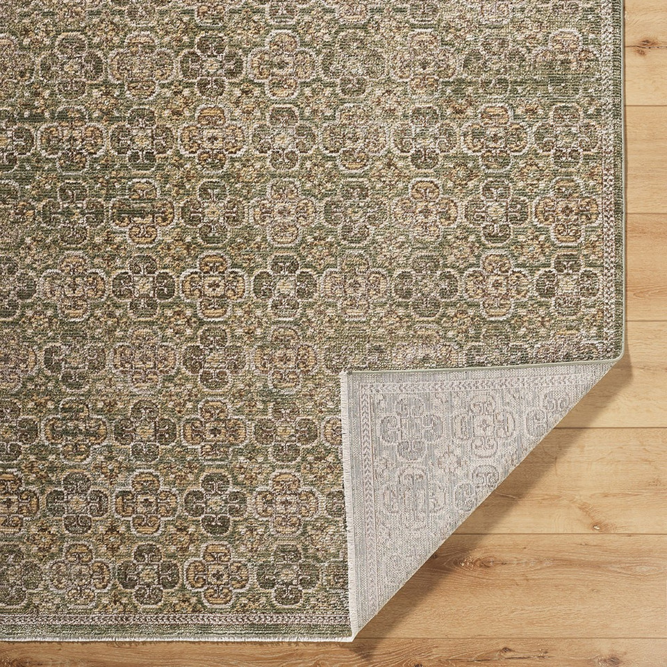 olive abstract rug corner fold on wood floor