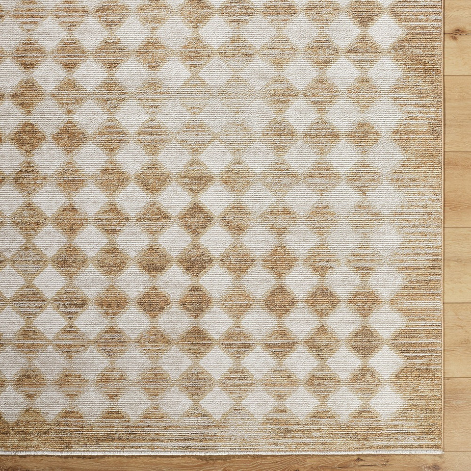 mustard geometric rug closeup corner on wood floor