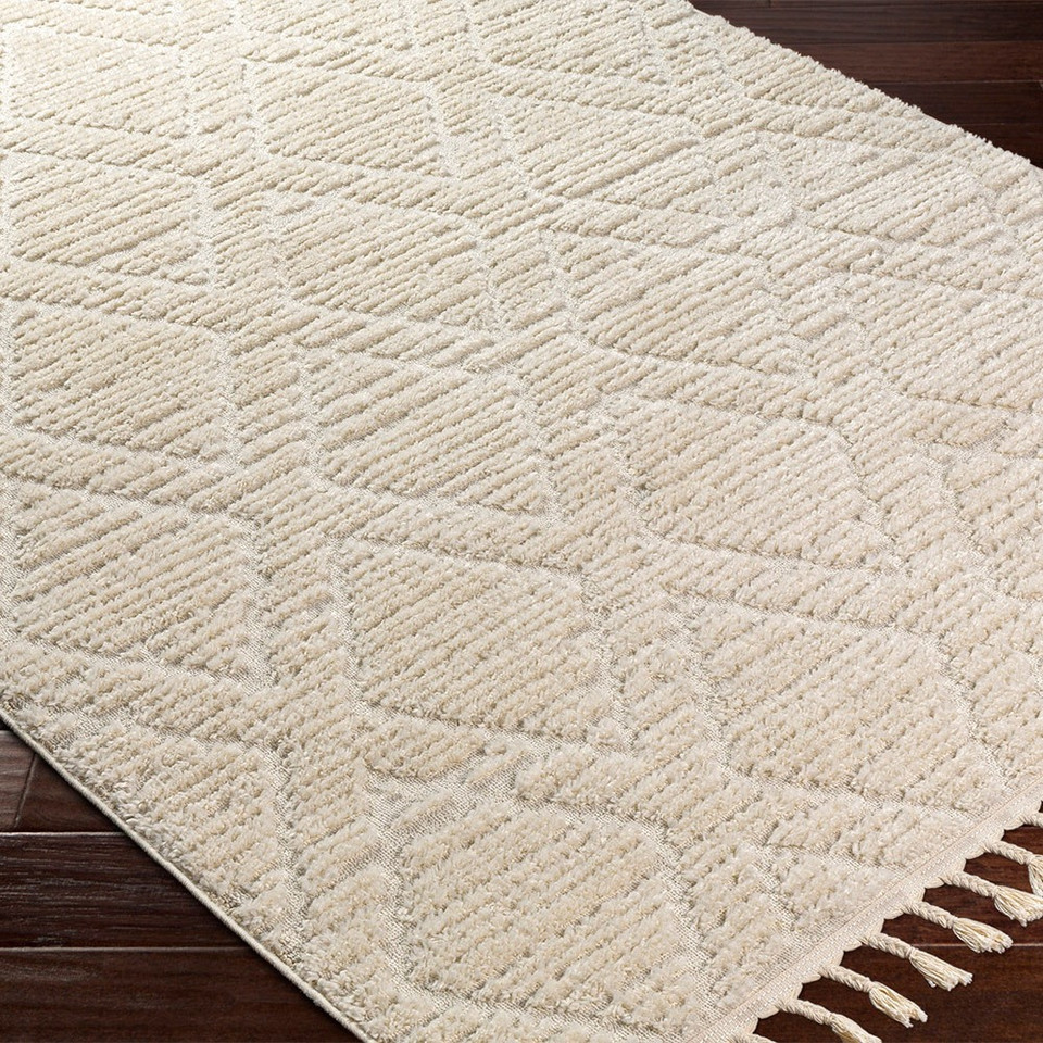 beige berber geometric rug closeup corner on wood floor