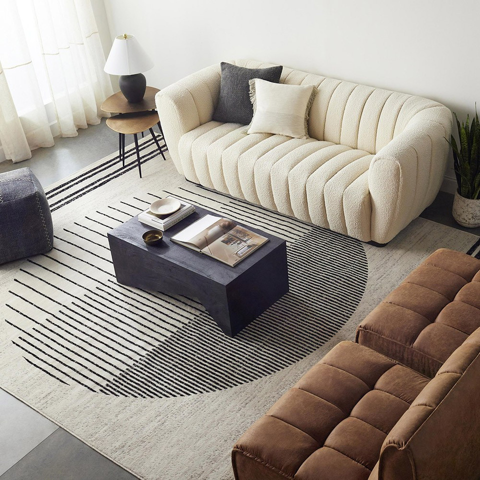 mono geometric rug in a room with matching decor