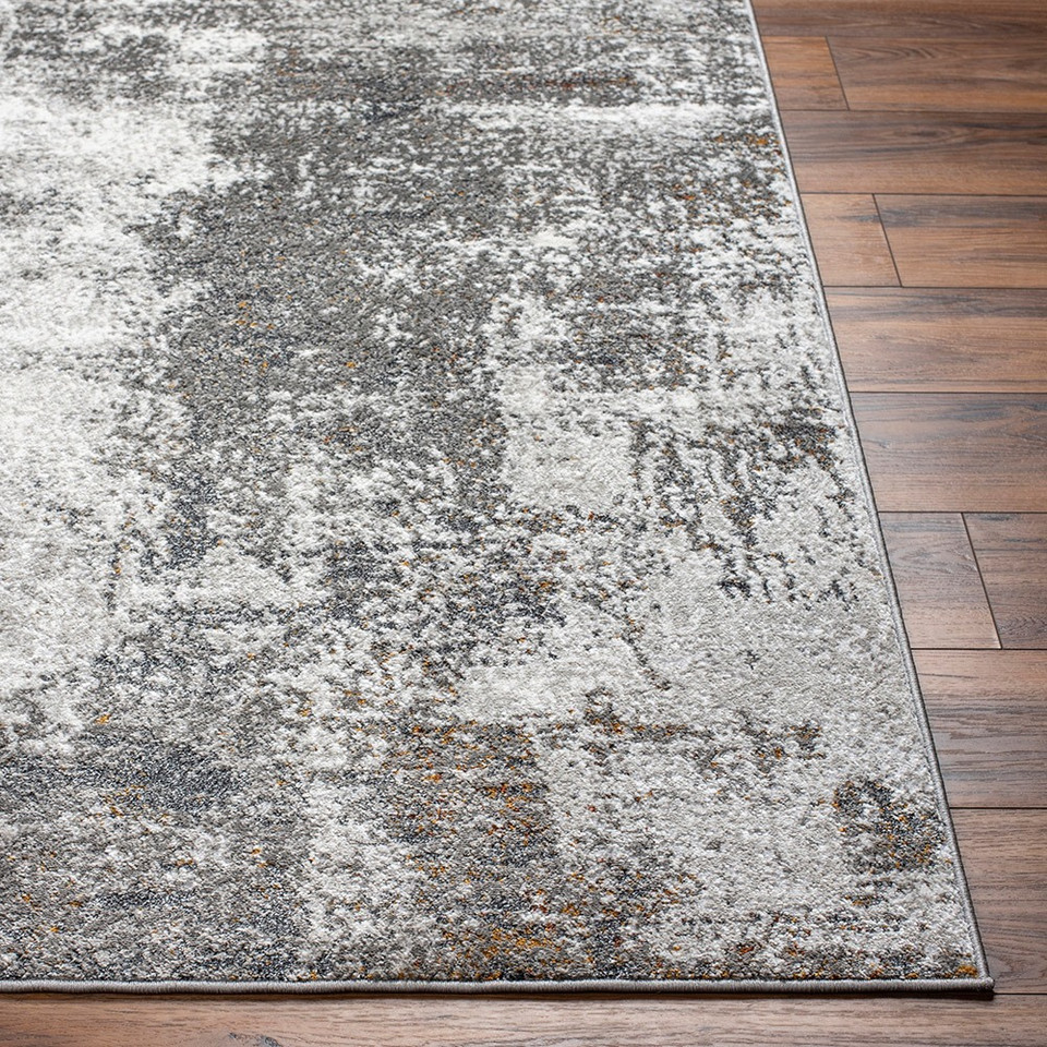 grey abstract rug closeup corner on wood floor