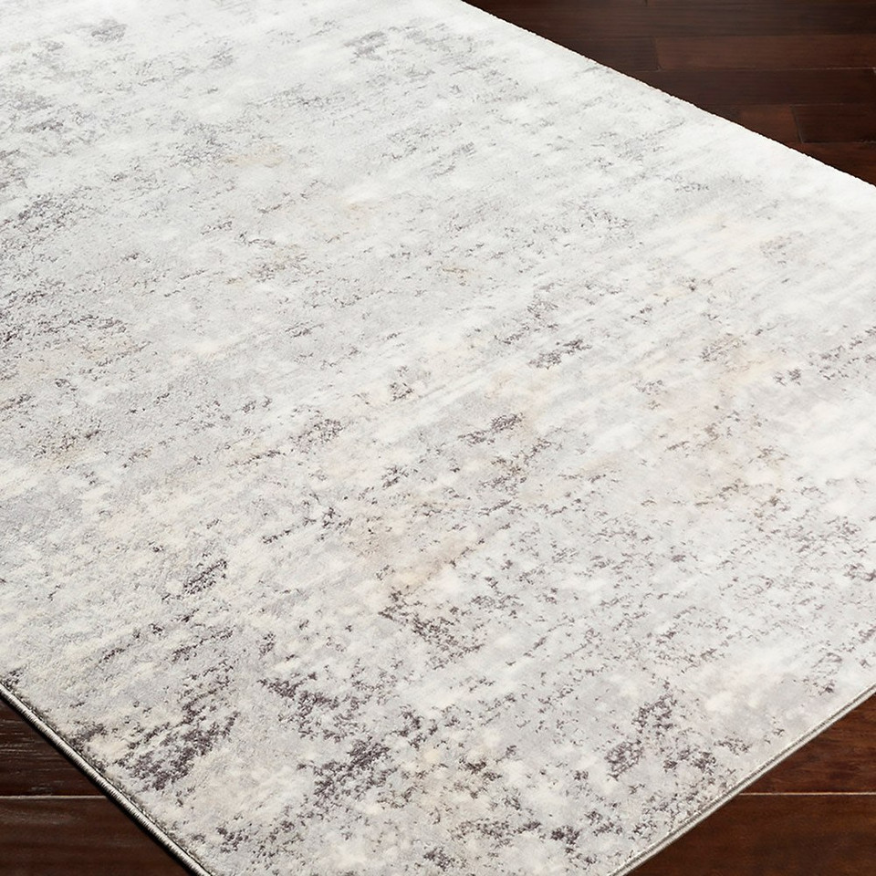 silver abstract rug closeup corner on wood floor