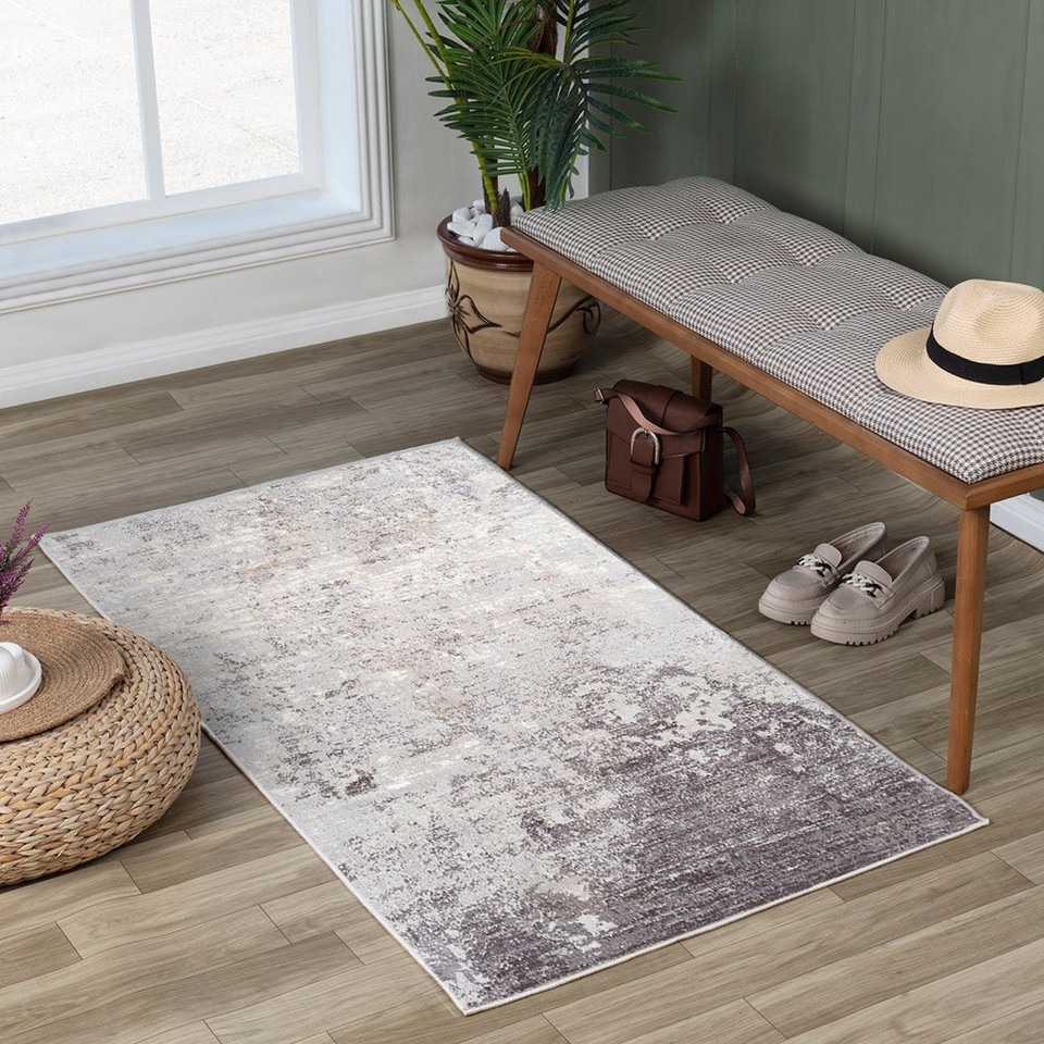 silver abstract rug in a room with matching decor