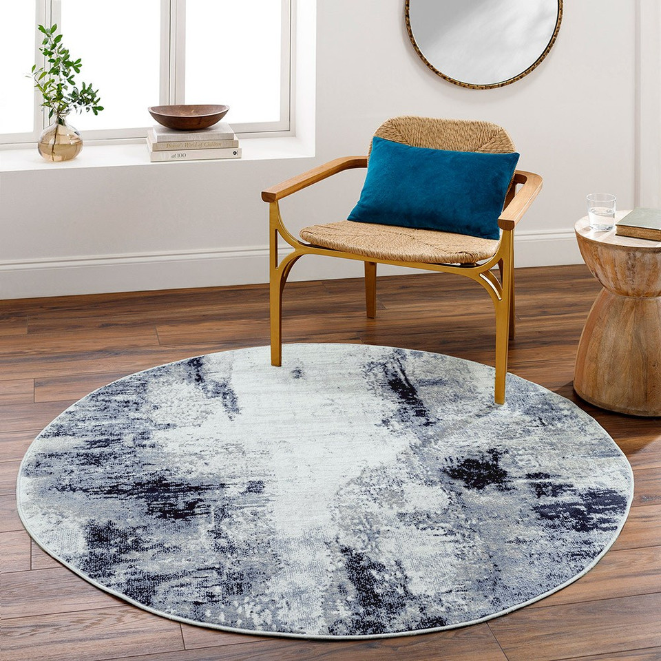 navy abstract rug in a room with matching decor