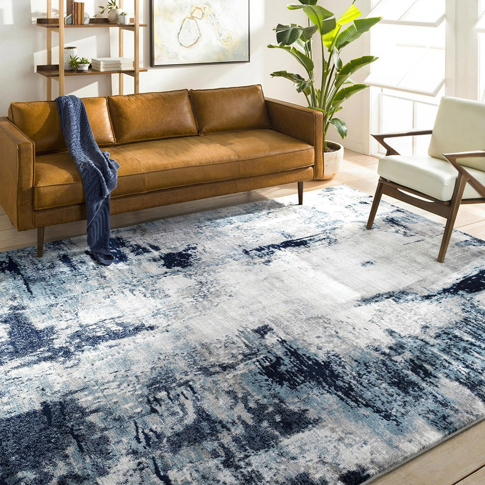 navy abstract rug in a room with matching decor