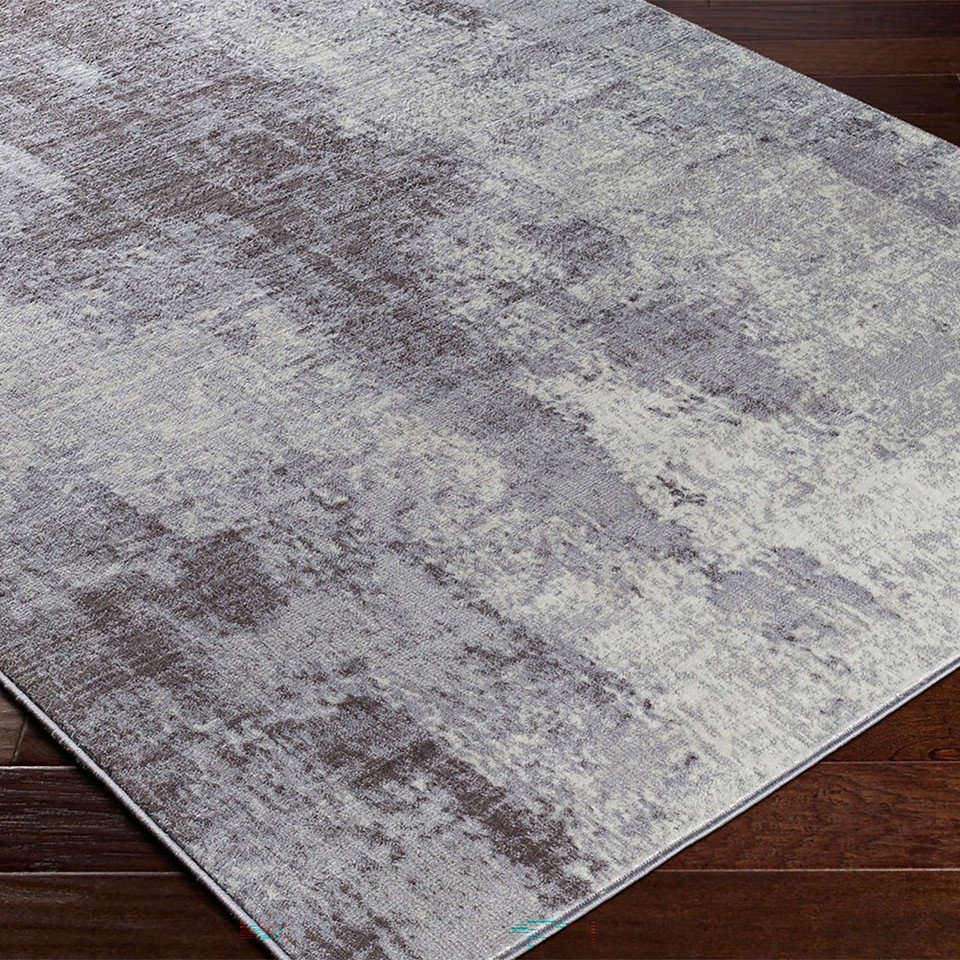 cream abstract rug closeup corner on wood floor