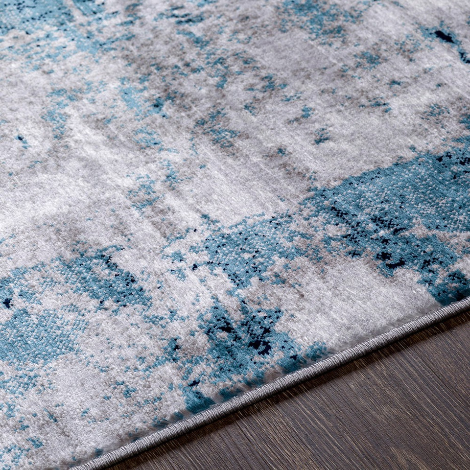 teal abstract rug closeup detail