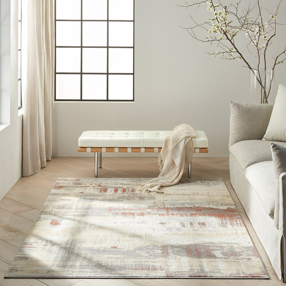 grey rust calvin klein rug in a room with matching decor