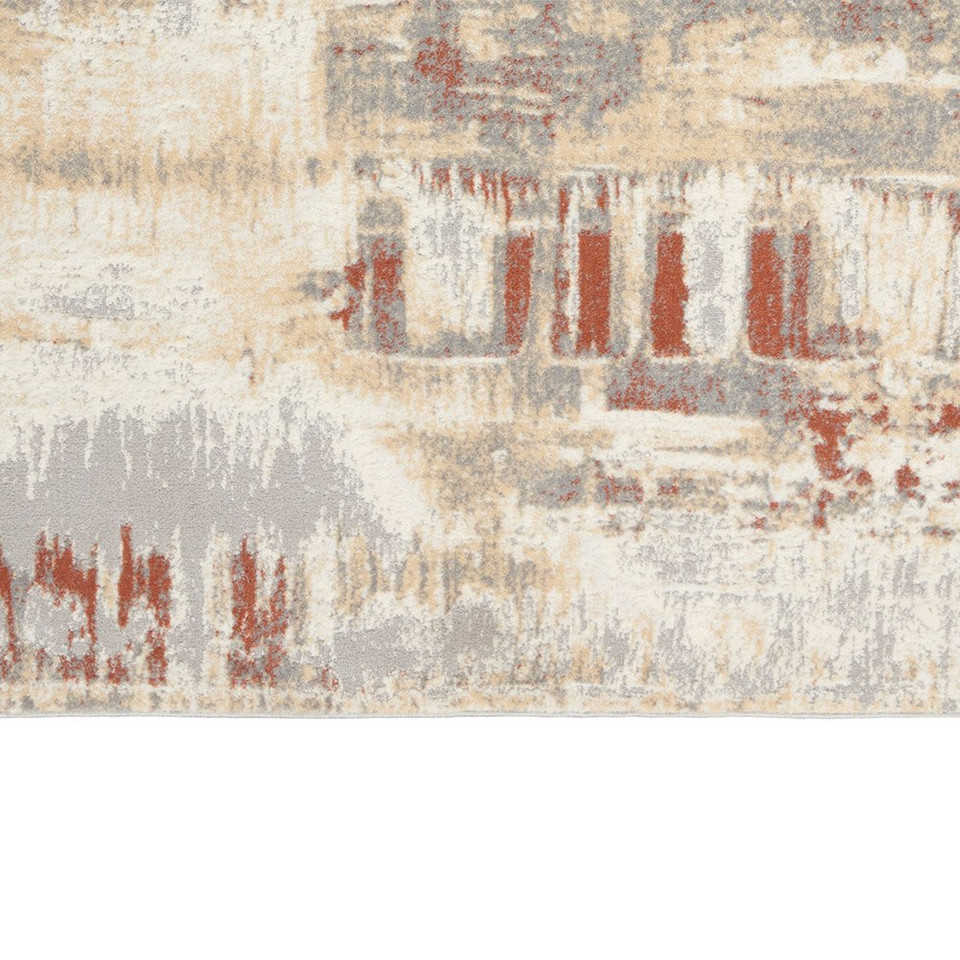 grey rust calvin klein rug closeup edge on white background