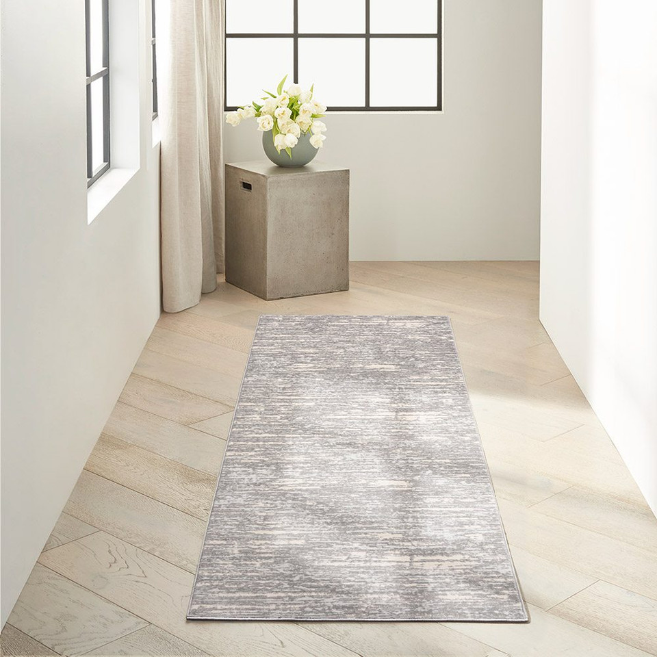 grey beige calvin klein rug in a room with matching decor