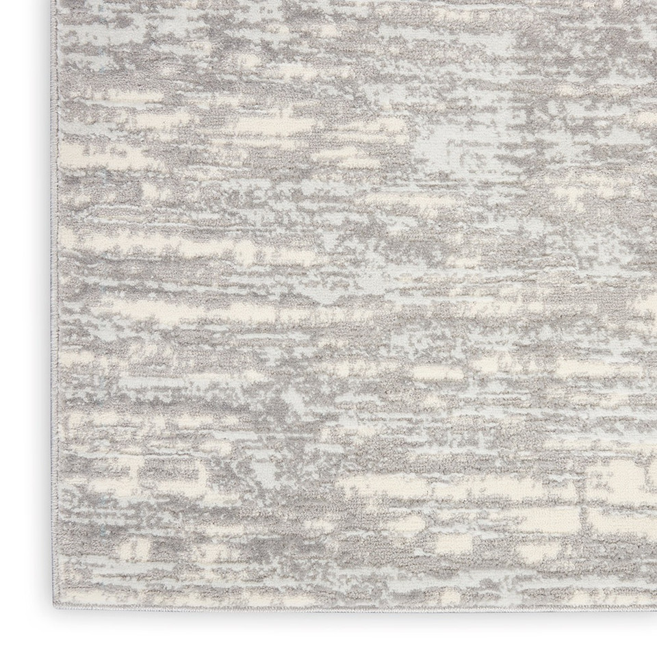 grey beige calvin klein rug closeup corner on white background