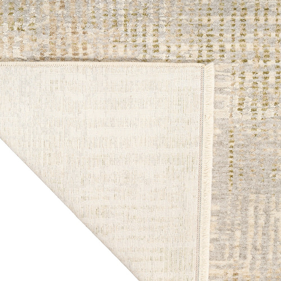 grey calvin klein rug corner fold on white background