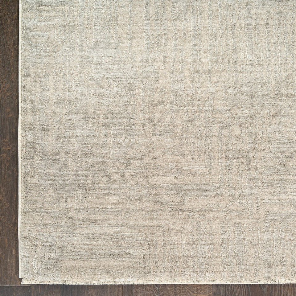 grey abstract rug closeup corner on wood floor