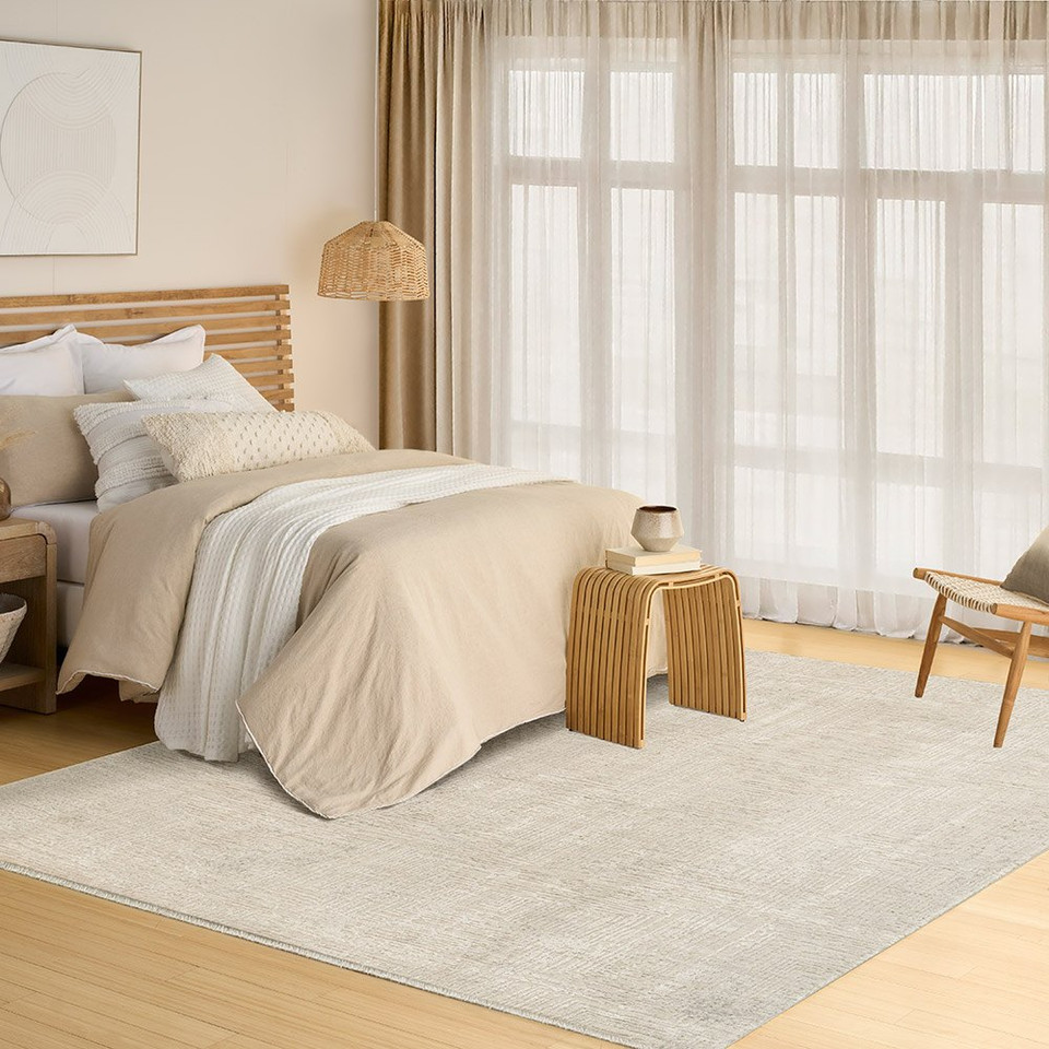 ivory beige abstract rug in a room with matching decor