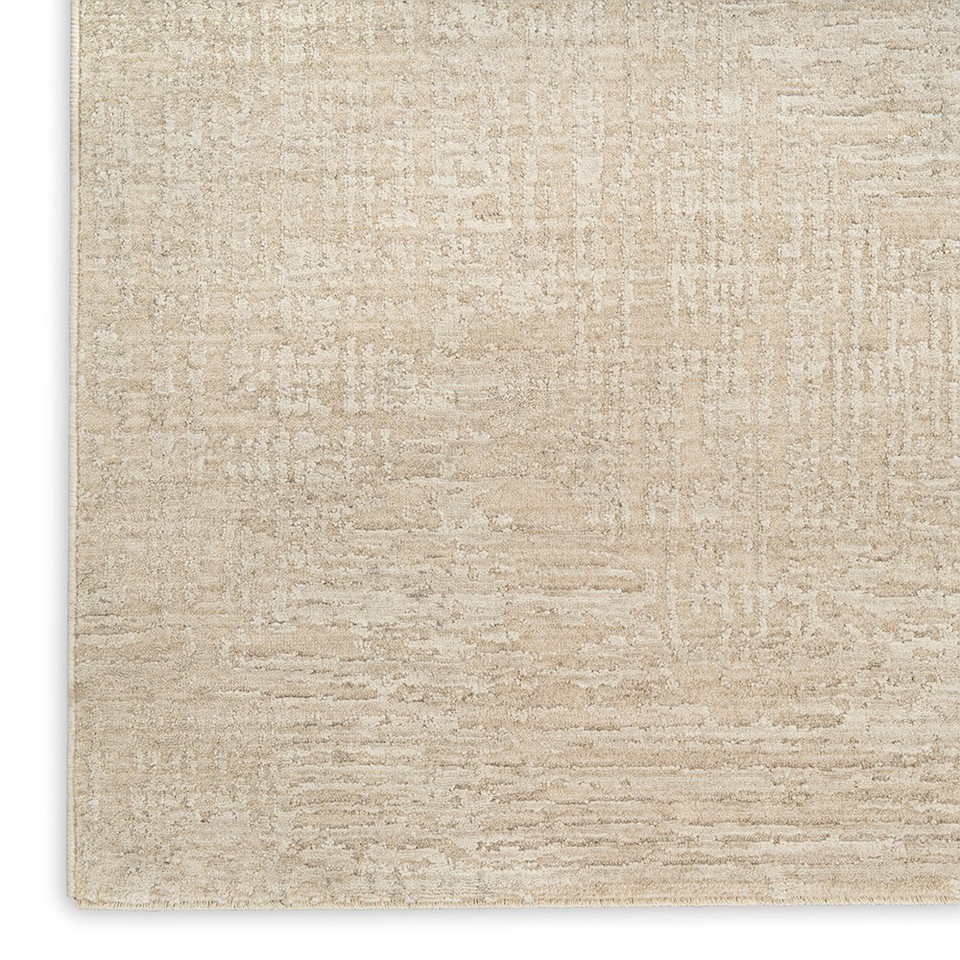 ivory beige abstract rug closeup corner on white background