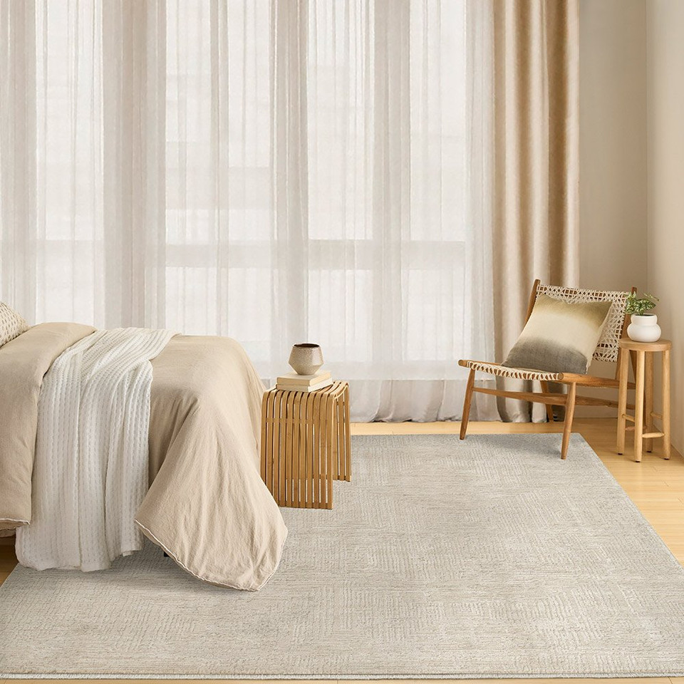 ivory beige abstract rug in a room with matching decor