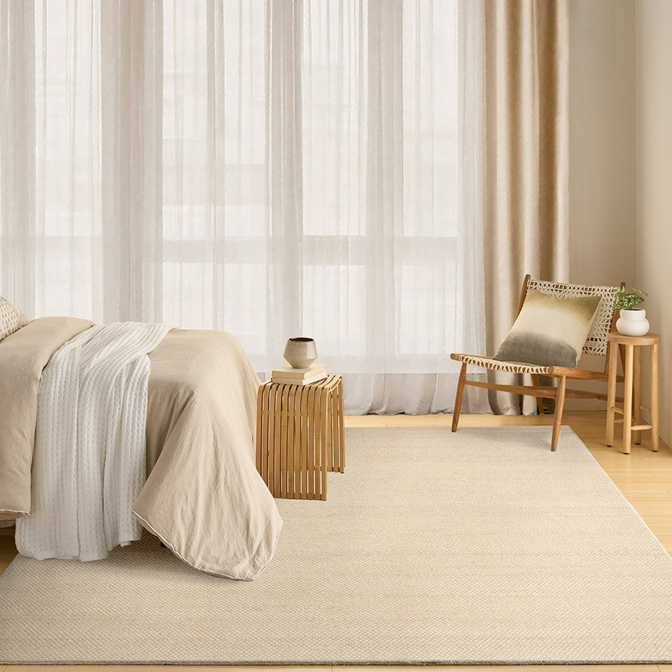 ivory beige rug in a room with matching decor