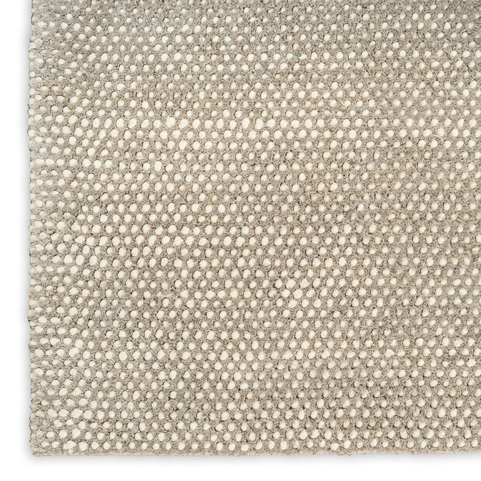ivory grey rug closeup corner on white background