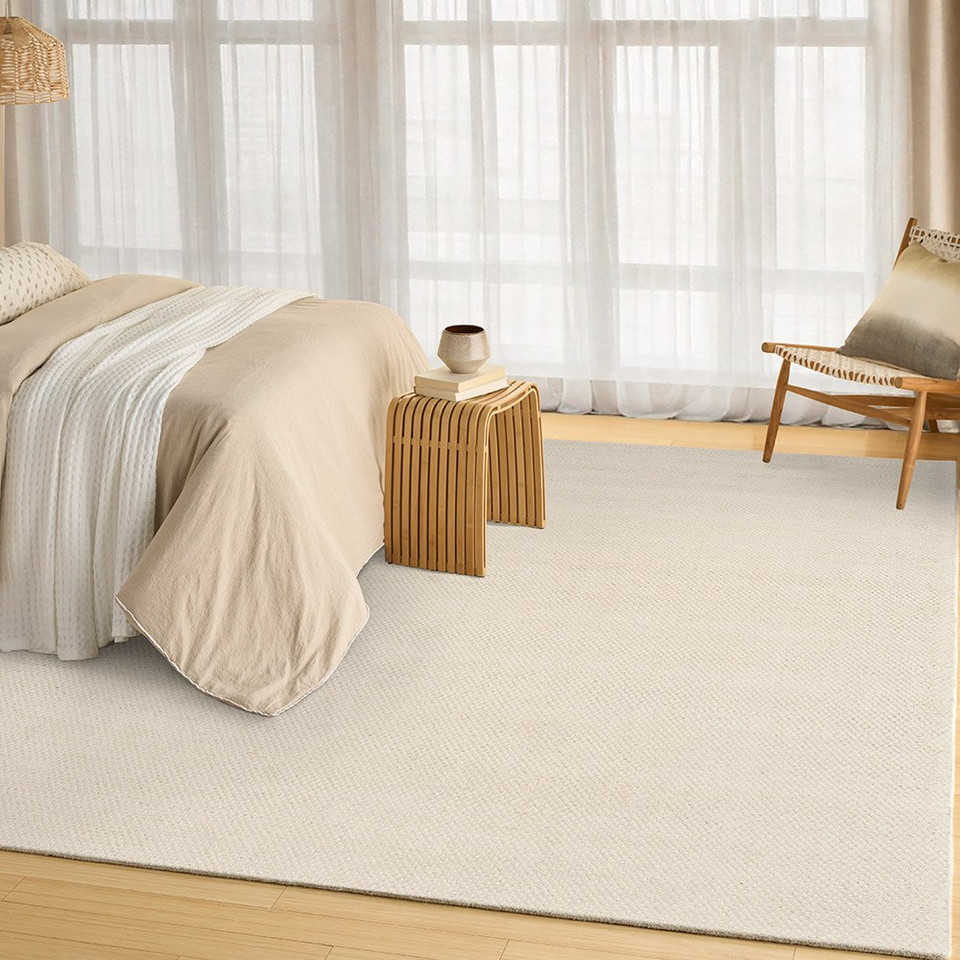ivory rug in a room with matching decor