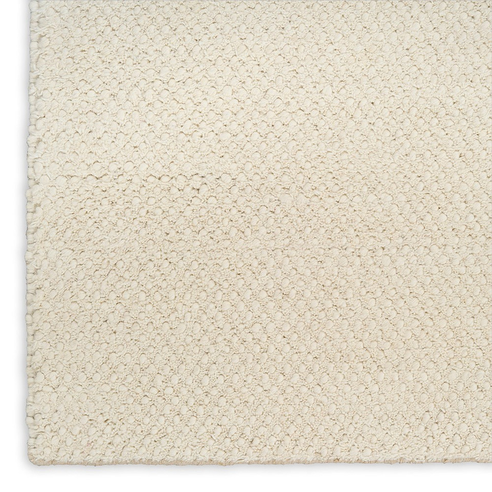 ivory rug closeup corner on white background