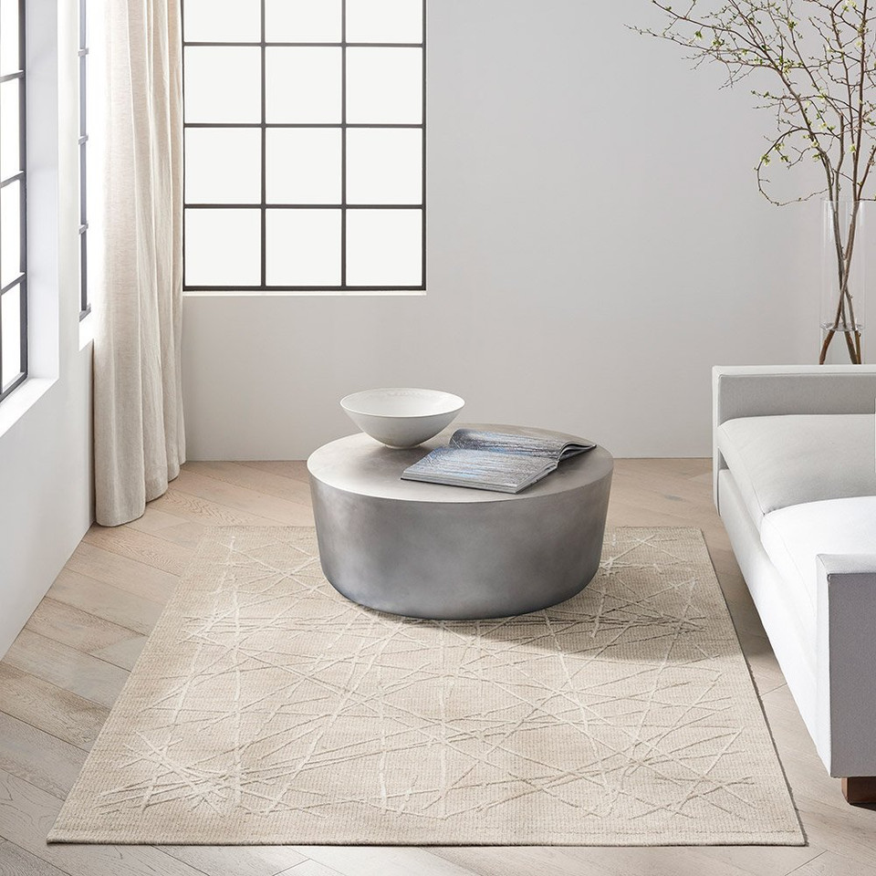 taupe calvin klein rug in a room with matching decor