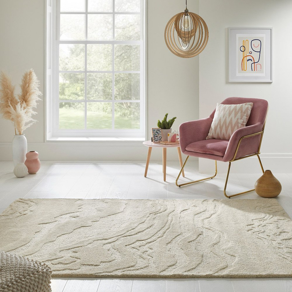 ivory abstract rug in a room with matching decor