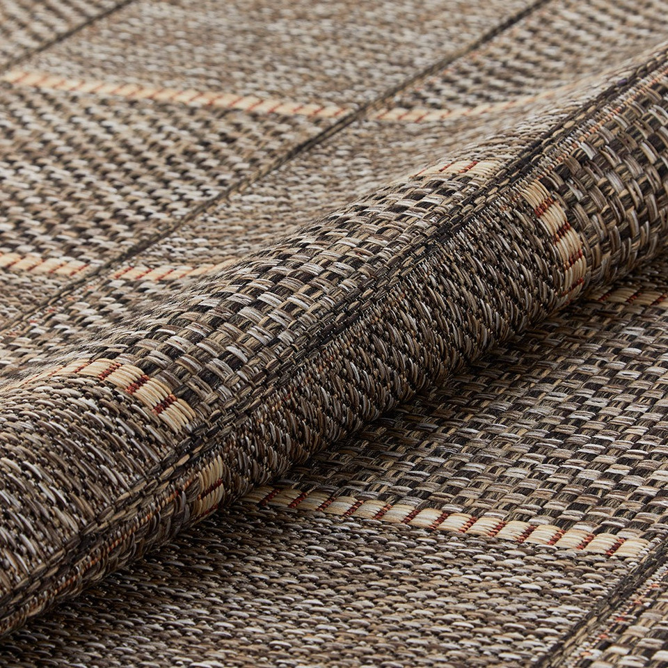 mocha rug closeup partially rolled