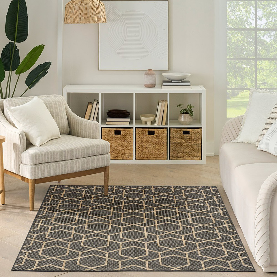 charcoal geometric indoor outdoor rug in a room