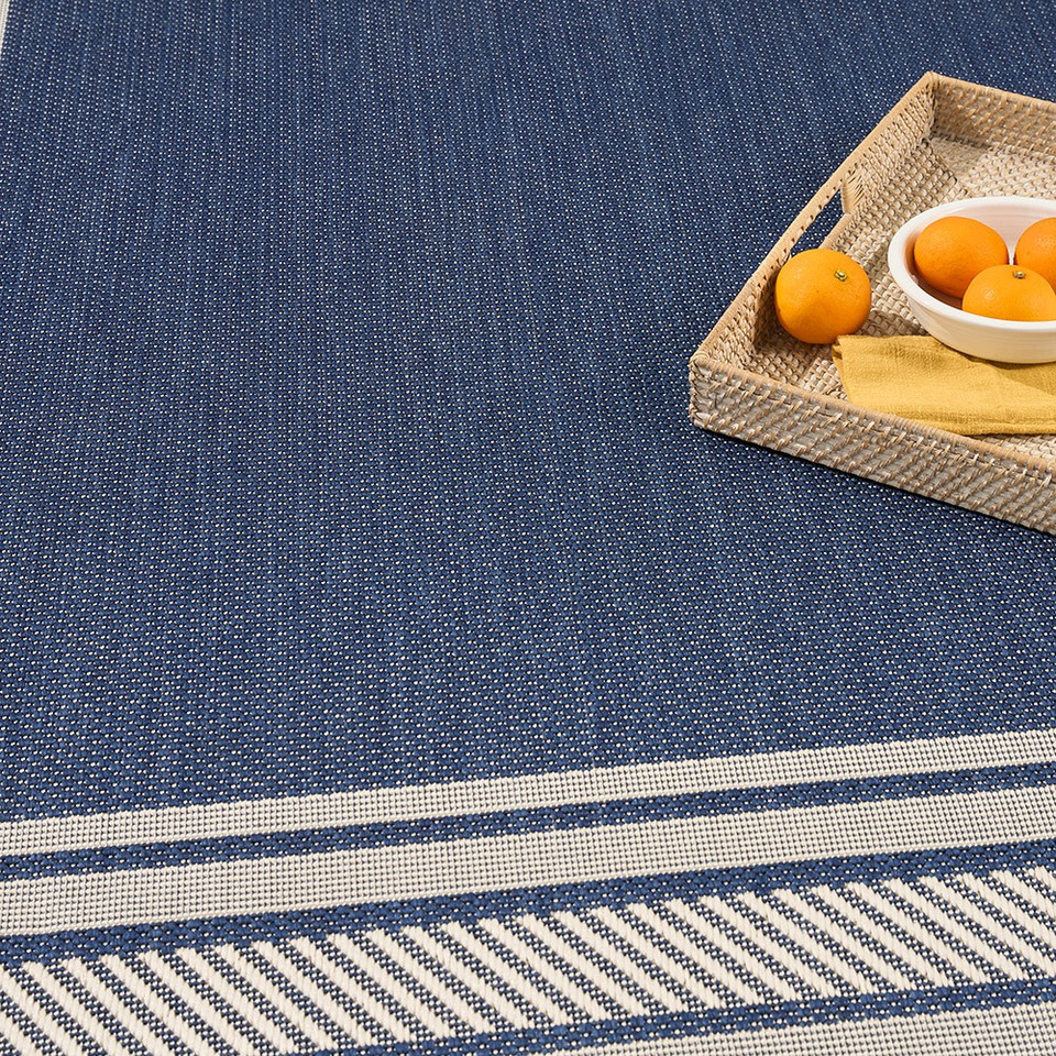 navy geometric indoor outdoor rug closeup detail