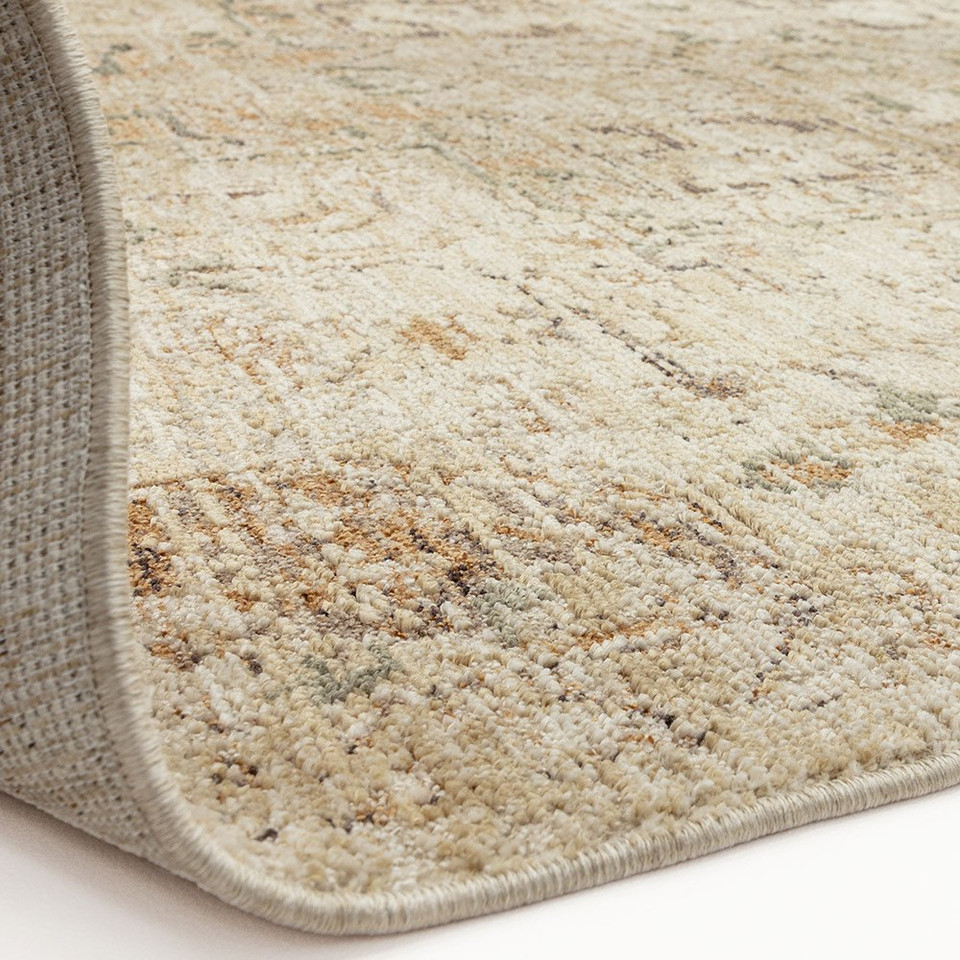 copper traditional rug partial fold on white floor