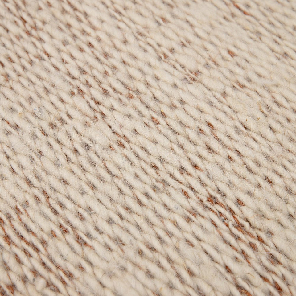 rust flatweave wool rug closeup detail
